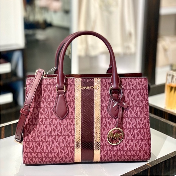 Michael Kors Sheila Medium Signature Logo
Metallic Satchel Crossbody - Picture 10 of 12